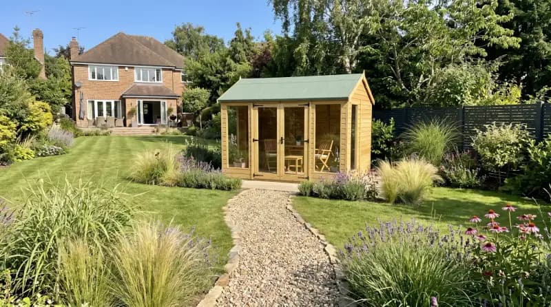 Timber garden building in a customer's garden